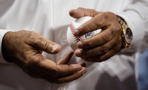 Ikon CEO throws first pitch